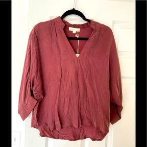 Women’s burgundy blouse